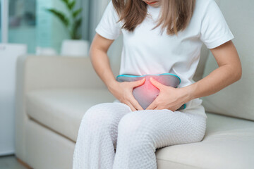 Menstruation period cycle of monthly and Stomachache concepts. woman having abdomen pain and...