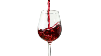 Red wine pouring in glass 