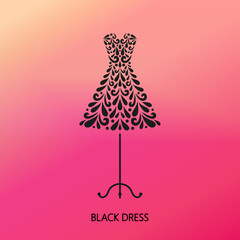 Small black dress on the hanger. Floral mosaic style. Fashion concept.