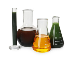 Laboratory glassware with different types of crude oil isolated on white