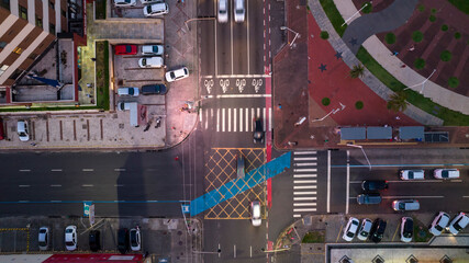 Intersection with digital billboard, traffic crossing, safety paintings, lights and pedestrian...