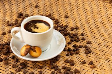 Colombian origin coffee - White cup with delicious coffee and sweet cookies