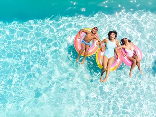 Diverse family enjoy a pool day, with copy space © WavebreakMediaMicro