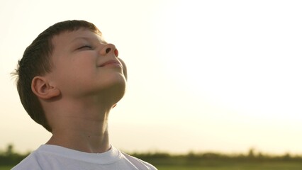 boy son child looking sky happy face smile childhood dream prayer sun ask make wish, boy peaceful...
