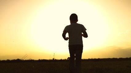 boy son child running grass son sun sunset field park playground joyful happy running children's...