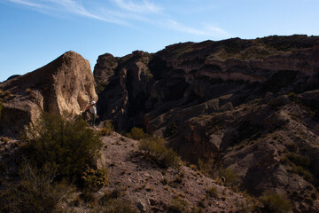 Woman looking towards the mountains.