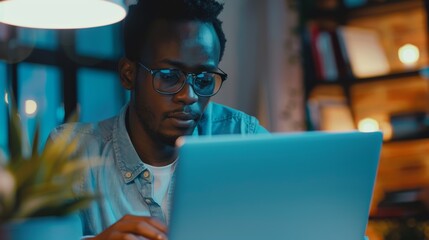 man working on laptop, concentrated man, serious man working