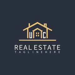 UC monogram logo for real estate with home shape creative design.