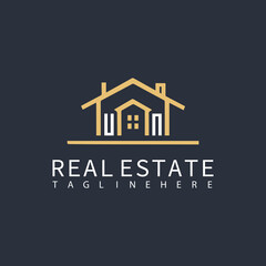 UN monogram logo for real estate with home shape creative design.