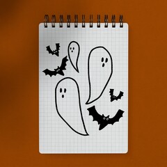 Halloween ghosts on paper, cute doodle flat lay style