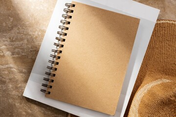 Kraft notebook, hard cover design, flat lay with natural light