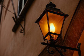 Evening vintage old style street lamp on the street