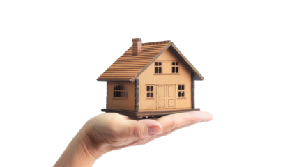 Hand holding a model house