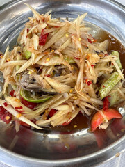 thai spicy papaya salad on table, thai food
