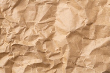 Crumpled brown paper texture background