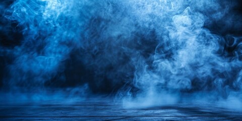 Dramatic blue smoke creates an abstract dance against a stark black backdrop.