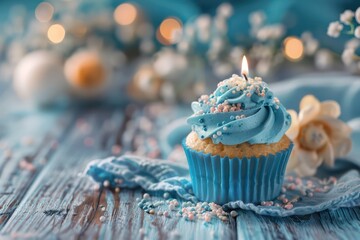 blue cupcake wrapper, adorned with a candle and sprinkles - Powered by Adobe