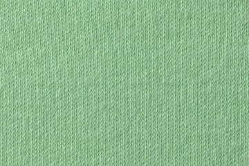 Green background, knitted fabric texture , macro shot design