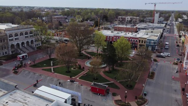 Arkansas city of Bentonville aerial footage of main park in city center 