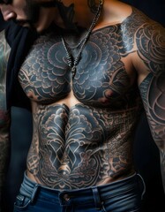 close up of a man with a tattoo on his body