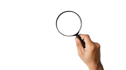 Hand holding magnifying glass