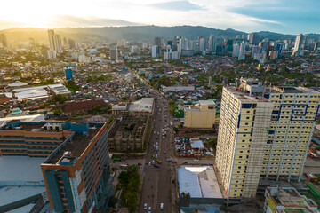 Naklejka na ściany i meble Cebu City, Philippines - The North Reclamation Area and the Cebu Skyline during Golden hour.