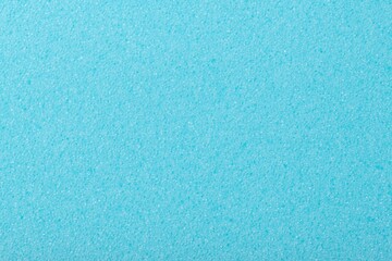 Blue background, rough sponge texture, macro shot design