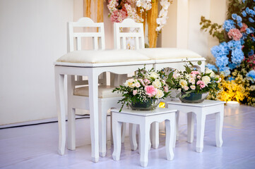 white couple chairs of bride and groom in thai wedding ceremony event