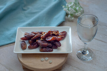 Dates and pure drinking water is consume to end Ramadan fast. Breaking Ramadan fast at Iftar.