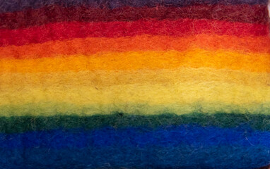 The velvet fabric is colored in a variety of rainbow tones, a symbol of sexual pluralism.