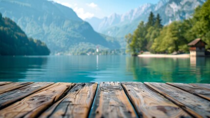Obraz premium A calm and peaceful wooden deck by a crystal clear alpine lake surrounded by majestic mountains in a serene setting.