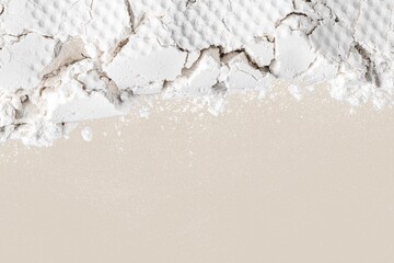 White powder texture, beige background