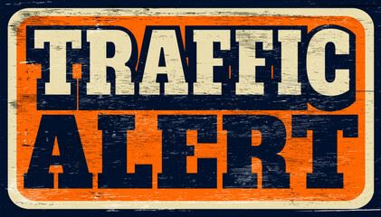 Aged retro traffic alert sign on wood