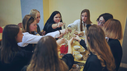 High school children eat in the school canteen.
