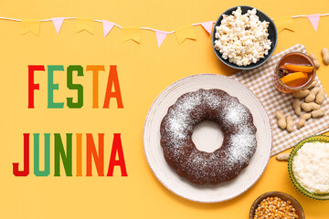 Traditional food with flags for Festa Junina (June Festival) on yellow background