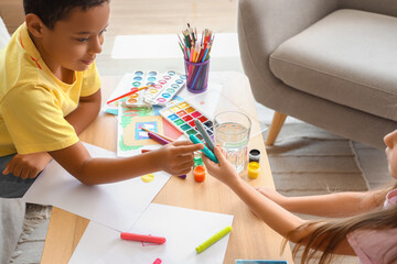 Cute little children drawing at home, closeup