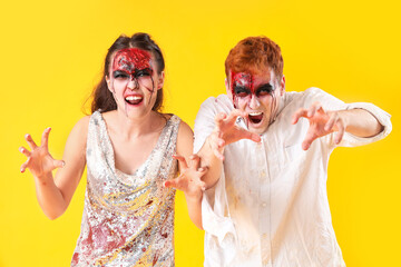 Scary zombies on yellow background