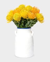 Yellow pincushions in white vase, flower arrangement, home decor