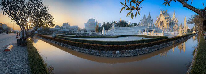 Wat Rong Khun - White Temple Sunrise Side View with no people panorama
