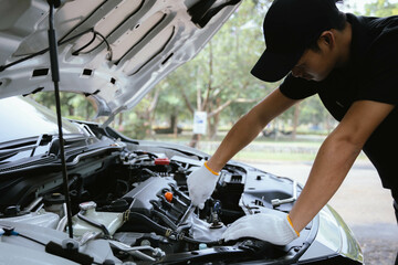 Mechanic checking engine Gather detailed information during work. Industrial plant maintenance...