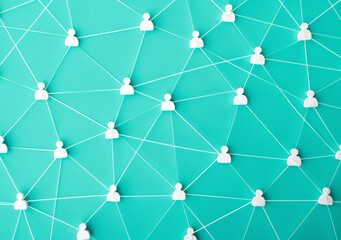 social network concept with connected people icons on blue background, flat lay, top view. AI art