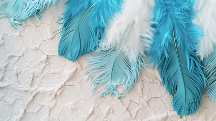 Soft turquoise ostrich feathers finely textured on a sandstone background.