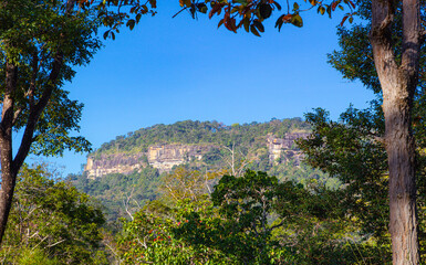 Natural rock mountain in tropical forest.