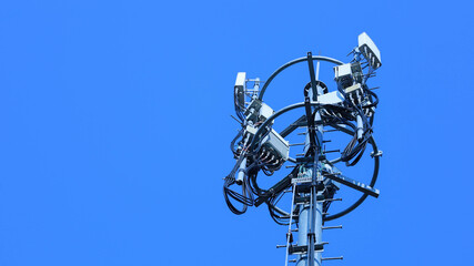 Cell sites on metal poles. Closeup cellular 4G and 5G wireless communication transmitter on...