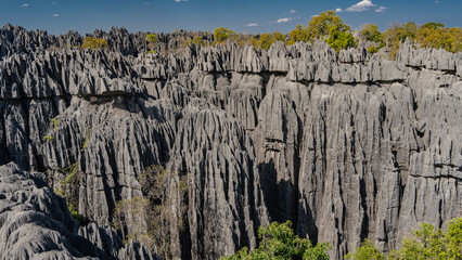 The incredible karst rocks of Madagascar. Sheer limestone cliffs with furrowed slopes and sharp...