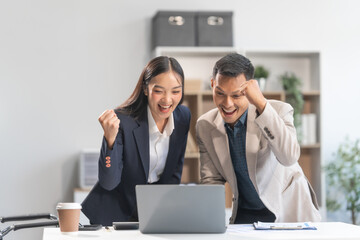 Collaboration between young Asian businesswoman and middle-aged businessman, achieving business success through dedication, effective efforts, and triumphant breakthroughs, milestones in careers.