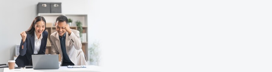 Collaboration between young Asian businesswoman and middle-aged businessman, achieving business success through dedication, effective efforts, and triumphant breakthroughs, milestones in careers.