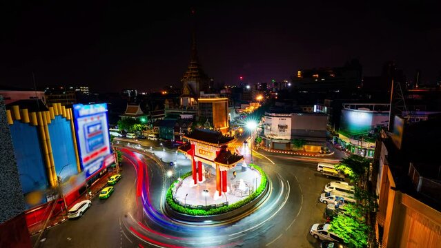 Time lapse long exposure at Odeon Circle. stunning lighting of the light in Bangkok. It is known as a gateway of Bangkok's Chinatown which Yaowarat as a main artery. Odeon Circle and Chinese gate.