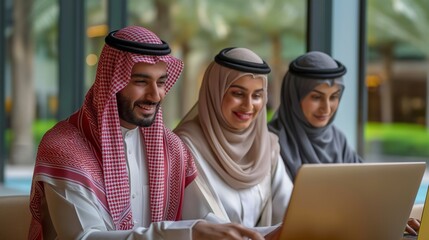 Group of Arab professionals collaborating on a laptop in a vibrant office setting, displaying teamwork and cultural inclusivity, Concept of global business collaboration and cultural diversity