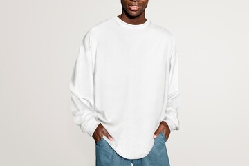 African American man wearing white sweater, close up